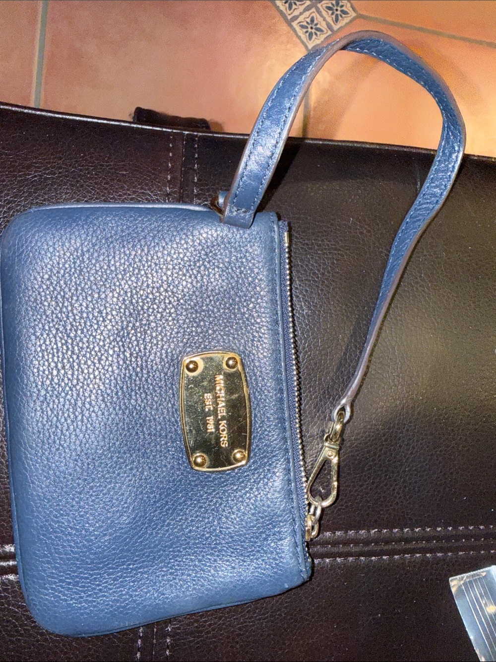 Michael Kors Blue Pebbled Leather Wristlet with Gold Plate